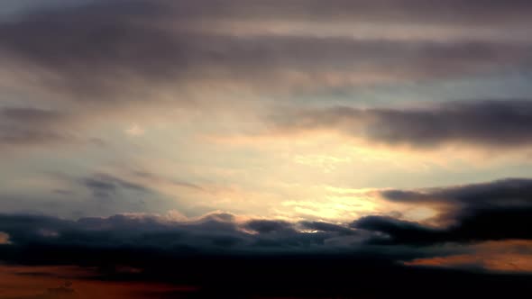 Beautiful view.Dramatic sunset. Moving cloudscape with beautiful sun