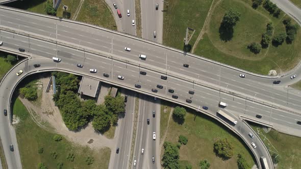 Top down aerial view of Road junction with car traffic in a city. 10 alt