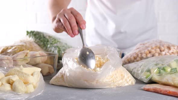 Frozen food. Frozen grated cheese in plastic bags