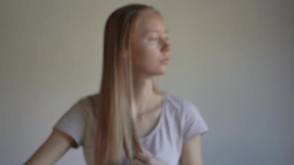 Young Woman Suffers From Hair Loss. Hair Loss Concept alt