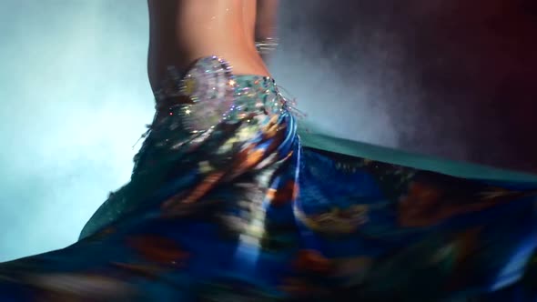 Beautiful Sexy Woman Belly Dancer in Blue Dress, Finish, on Black, Back Light, Close Up alt