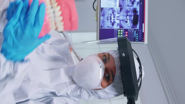 Vertical Video Patient Pov of Dentist Medical Team Teaching Child to Clean Teeth alt