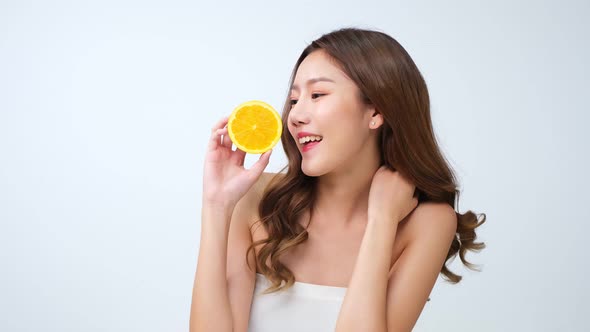 Beautiful Young Asian Woman long hair  with Clean Fresh Skin. alt