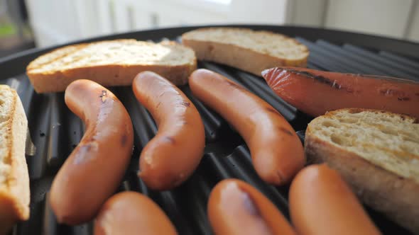 The Closer Look Fo the Frankfurter Toast on the Griller