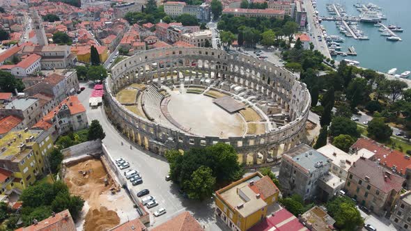 Aerial rotating shot view over Roman Arena in Pula, Istria, Croatia which is a Unesco World Heritage alt