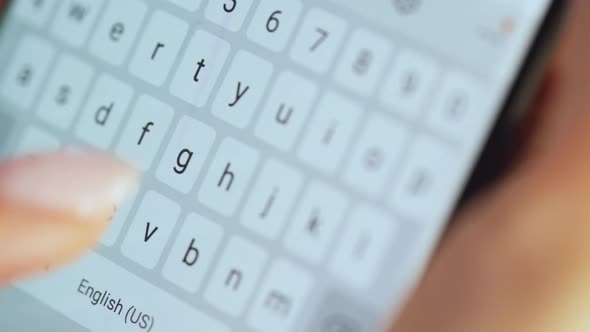 Hands Typing Text on Smartphone Close-up alt