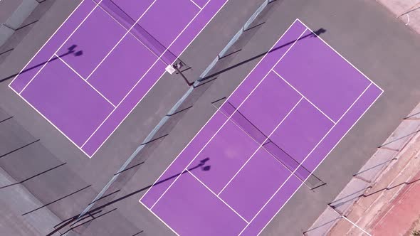 Aerial View of Drone Orbiting Around Tennis Courts