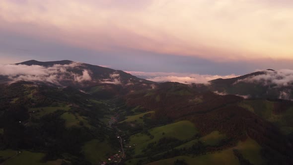 Foothill Village in a Hilly Landscape After the Rain at Sunset