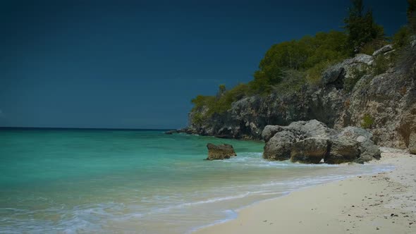 Playa Lagun Beach Cliff Curacao Beautiful Tropical Bay with White Sand and Blue Ocean Curacao alt