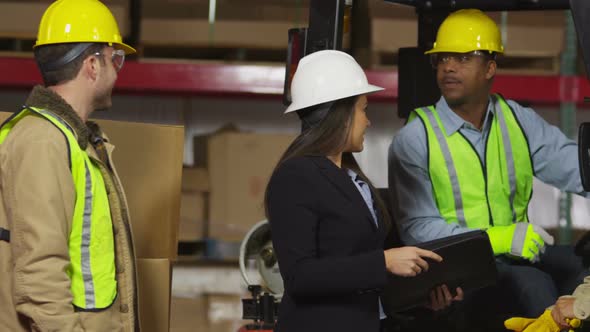 Portrait of industry workers in shipping warehouse alt