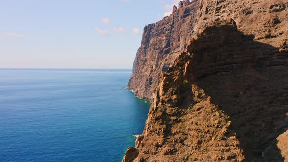 Aerial View Reveal of Mountains on the Blue Ocean in Tenerife Canary Islands Spain alt