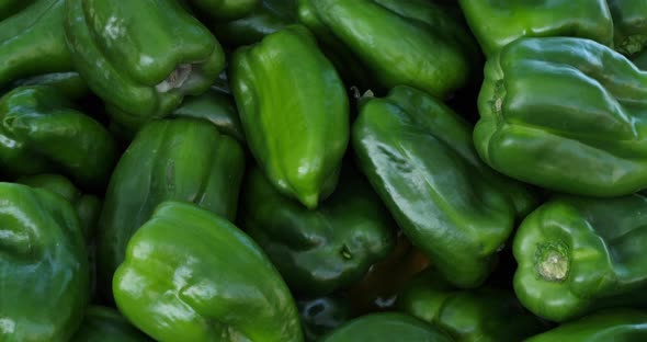 Bell peppers in a french vegetable market. alt