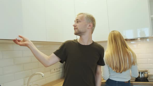 Young Happy Blonde European Couple of Friends Having a Conversation alt