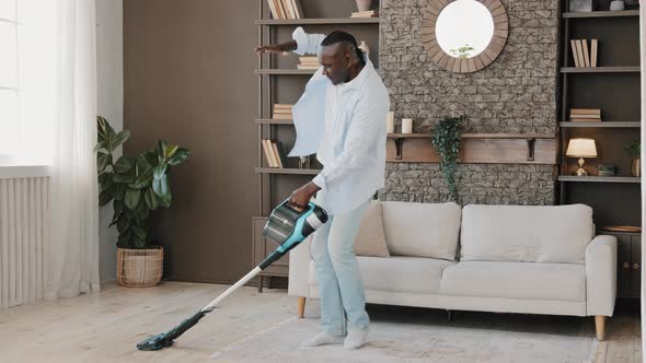 Excited Energetic Mature Senior Man Happy Dancing Adult Retired African Bachelor Homeowner Clean alt