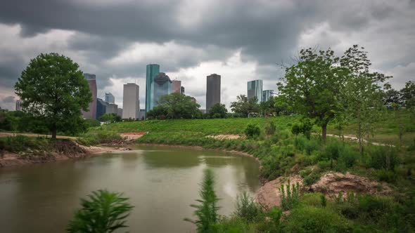 Time lapse of cloudy sky over downtown Houston. This view was taking from the Buffalo Bayou. This vi alt