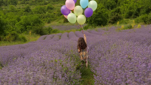Beautiful Child with Balloons in Lavender