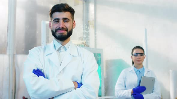 Charismatic Two Pharmacist Man and Woman in the alt