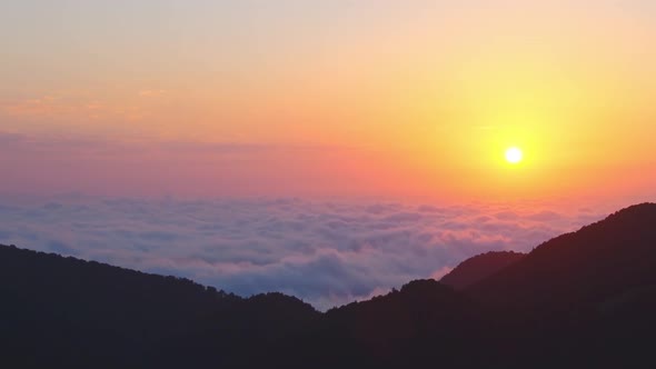 Sunset Over Clouds Zoom In Background alt