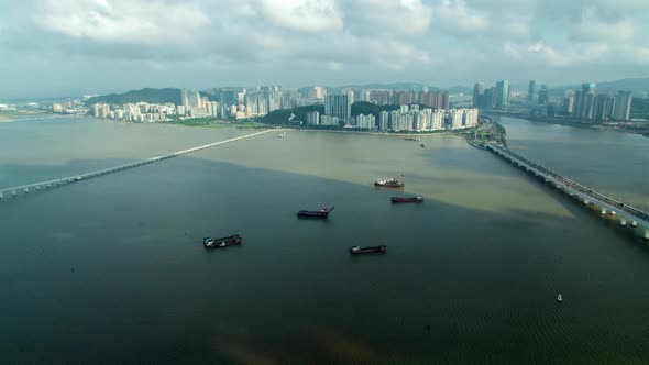 Macau Boats on Water at Chinese Buildings on Taipa Timelapse alt