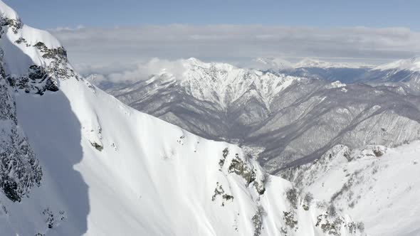 Aerial View From Mountain Peak to Village Krasnaya Polyana and Mount Achishkho From Aibga Ridge alt