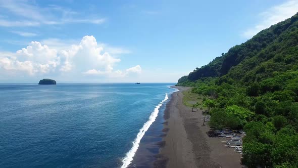 Aerial View along Black Sand Bugbug Beach (Pantai Bugbug), Bali, Indonesia