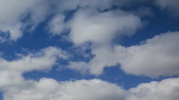 Timelapse of flying clouds alt