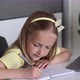 Caucasian Little Girl School Pupil Studying Online From Home Watching Web Class Lesson or Listening - VideoHive Item for Sale