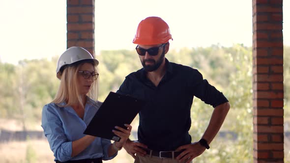 Real Estate Building Project Architect. Builder Constructor Read Blueprints.Civil Engineer Architect alt