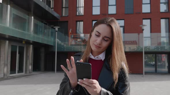 Young Woman Use Phone Feel Happy Sunlight Vlogger Influencer Comments Social Media alt