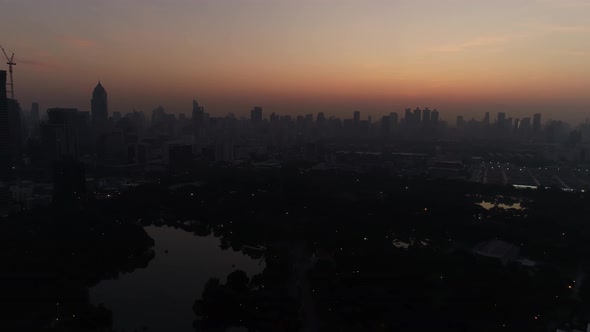 4k Aerial city view of Bangkok downtown, Flying over Bangkok, Thailand. alt