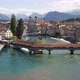 Aerial dolly of historic bridge over canal in Luzern, Switzerland - VideoHive Item for Sale