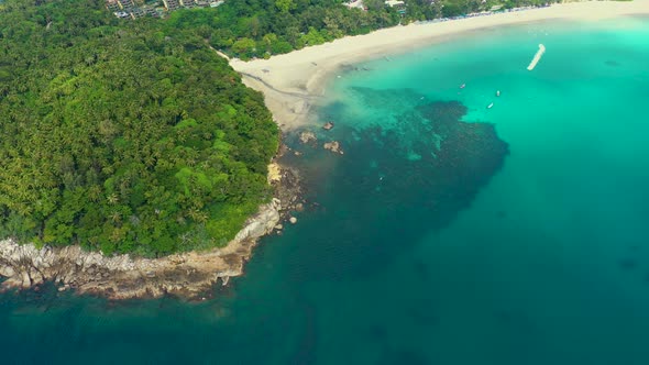 Nice rocks forested island, aerial panorama of Ko Pu against mountainous Phuket landscape on backgro alt