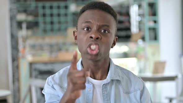 Portrait of Aggressive Young African Man Fighting Angry alt