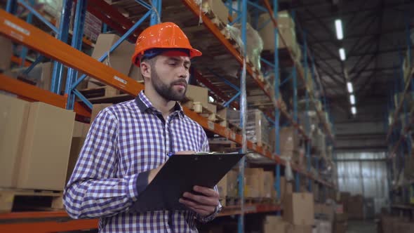 Employee Working with Documents in Storage. alt