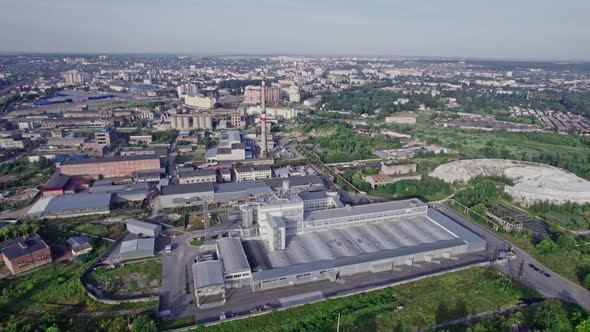 Aerial Top View of the Large Logistics Park with Factories alt