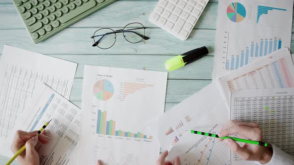 A Business People are Analyzing Documents or Diagrams and Brainstorming alt