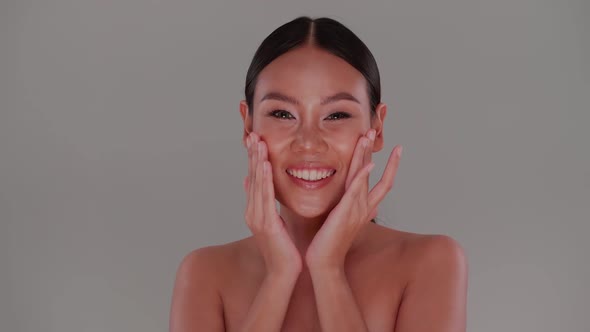 Beautiful face of Asian young woman with natural skin. Portrait of attractive girl with soft make-up alt