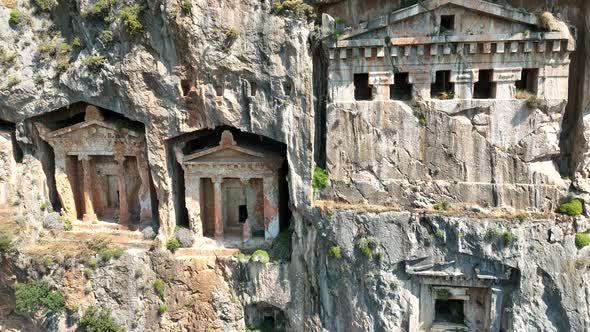 Dalyan - Mugla - Turkey, March 18, 2022, Moving boats with Mugla Dalyan view alt