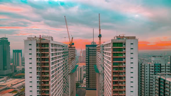 Futuristic Landscape of Construction of Skyscrapers in the China at Sunset Time alt