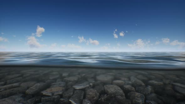Ocean Seascape with Sky and Ocean Wave Splitted By Waterline to Underwater Part alt