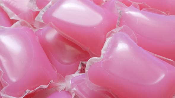 Slow tilt on liquid detergent packed in plastic bags  4K 2160p 30fps UHD tilting footage - Modern  l alt