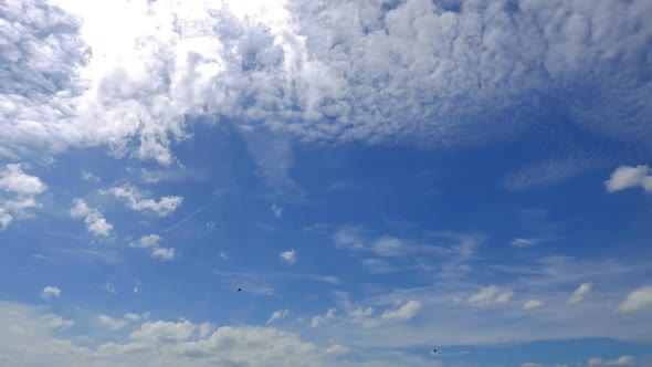 Time lapse of white cloud moving pass around sky background alt