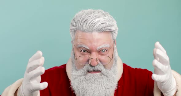 Negative Emotions of Angry Crazy Mad Screaming Santa Claus Swearing at Naughty Kid Which Will Not