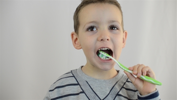 Child Brushing His Teeth 