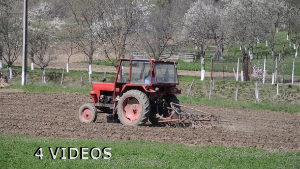 Tractor Plowing A Field 01