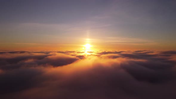 Cinematic drone video of flying above the clouds