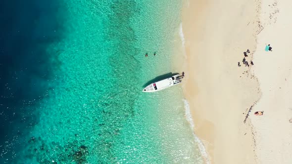 Aerial landscape of exotic coastline beach holiday by blue ocean with white sandy background of a da alt
