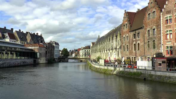 Vleeshuisbryg Bridge and traditional buildings along the Leie River in Ghent, Belgium.