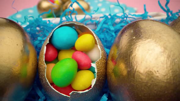 Easter Egg with Colorful Candies in a Basket Close Up