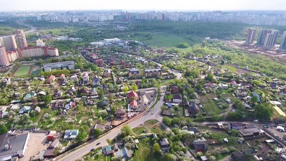 Flight drone over the Moscow region. Bird's eye view. Aerial survey of the village.